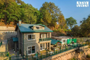 StayVista at Cas Mir with Pool & Lawn